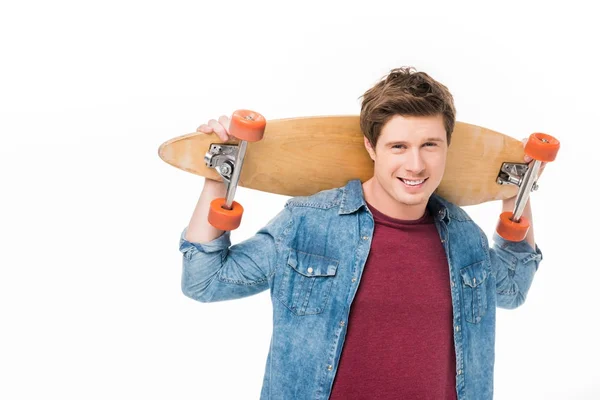 Junger Mann mit Skateboard — Stockfoto