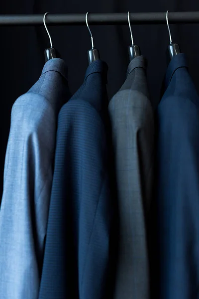 Suit jackets in boutique — Stock Photo