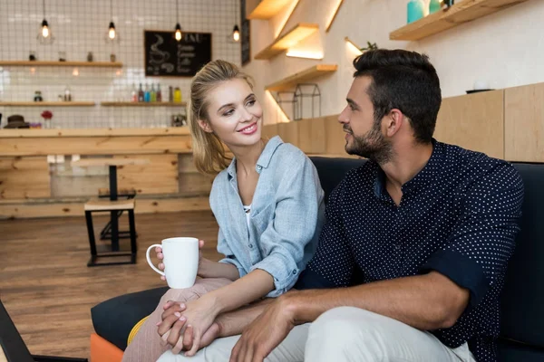 Young couple in cafe — Stock Photo
