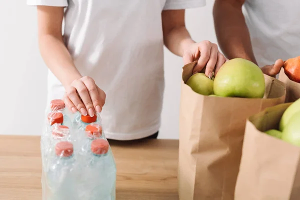 Volunteers with charity goods — Stock Photo