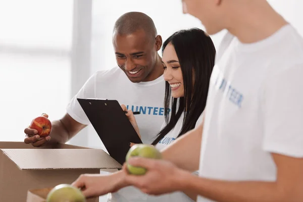 Group of multiethnic volunteers — Stock Photo