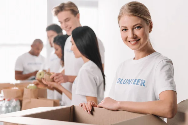 Multiethnic group of volunteers — Stock Photo