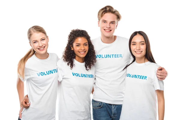 Jóvenes que abrazan voluntarios - foto de stock