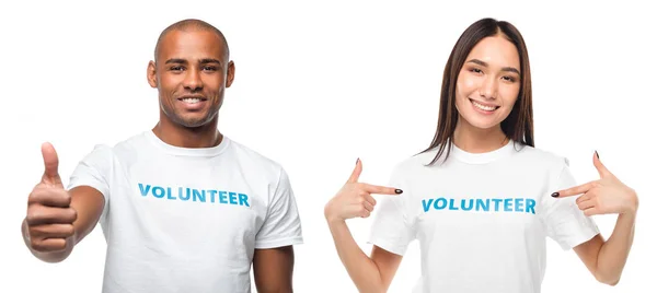 Couple of young volunteers — Stock Photo