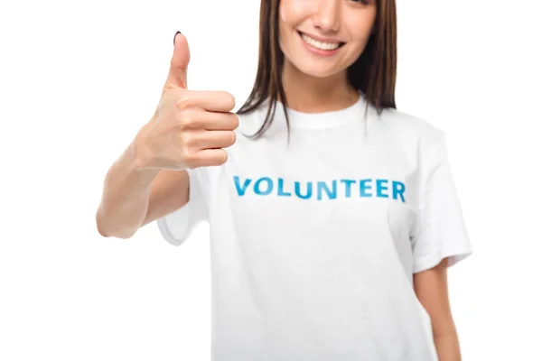Female volunteer showing thumb up — Stock Photo