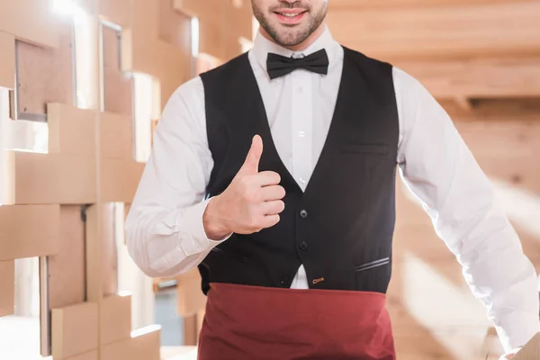 Waiter showing thumb up — Stock Photo