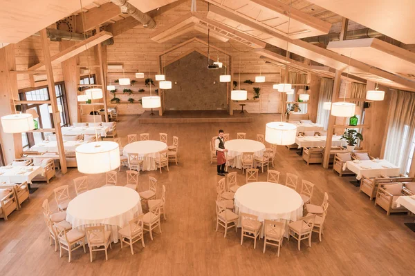 Waiter in empty restaurant — Stock Photo