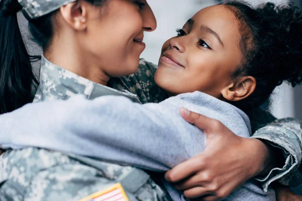 Happy daughter hugging mother — Stock Photo