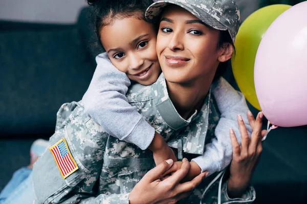 Daughter hugging her mother — Stock Photo