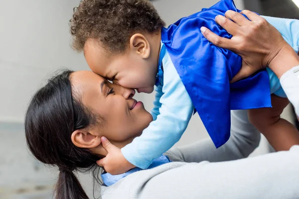 Happy african american mother and son — Stock Photo