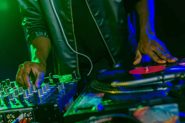 DJ with sound mixer and vinyl — Stock Photo