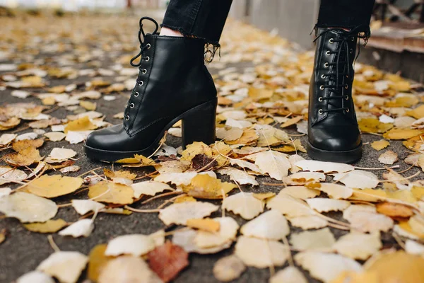 Woman in leather boots — Stock Photo