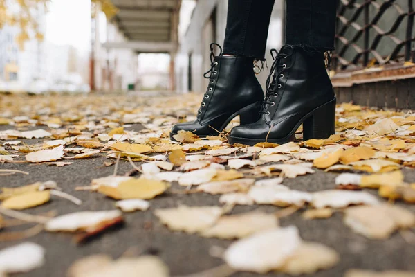 Woman in leather boots — Stock Photo