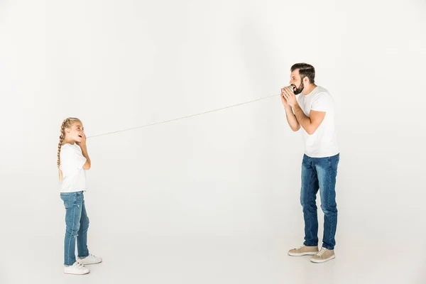 Father and daughter playing together — Stock Photo