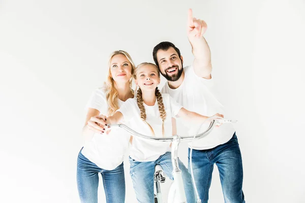 Happy family with bicycle — Stock Photo