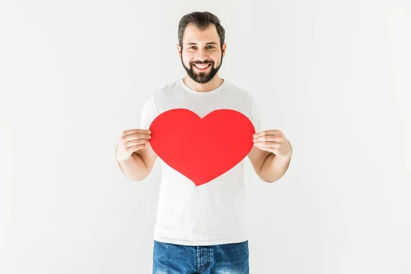 Hombre sosteniendo símbolo del corazón - foto de stock