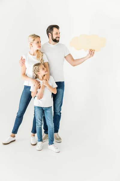 Family holding speech bubble — Stock Photo