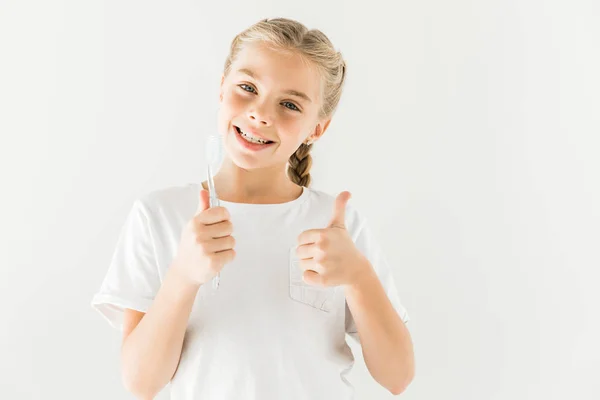 Child holding toothbrush — Stock Photo