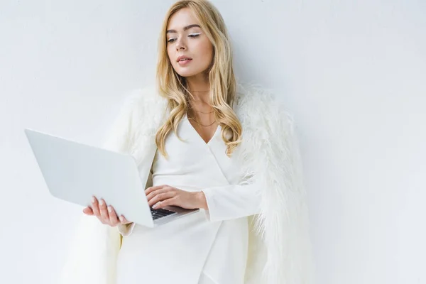 Stylish businesswoman with laptop — Stock Photo