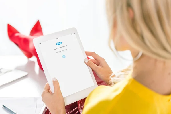 Woman using tablet with skype — Stock Photo