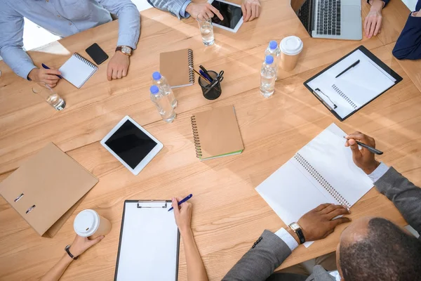 Cropped image of working business team — Stock Photo