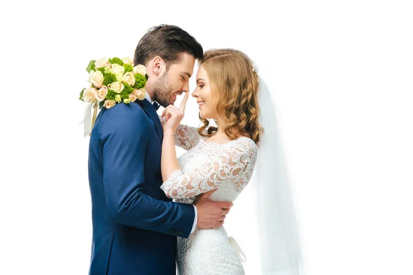 Sensual young wedding couple isolated on white — Stock Photo