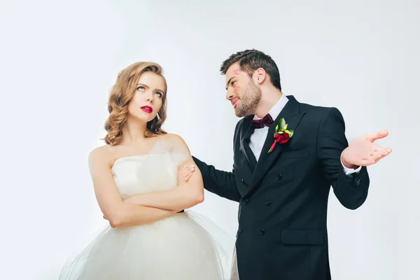 Portrait of young wedding couple having argument — Stock Photo