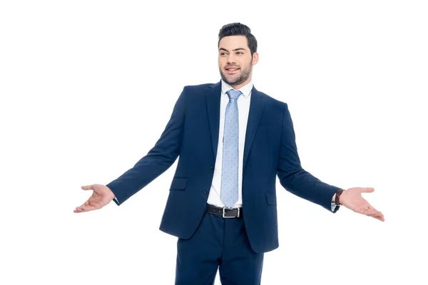 Homem de negócios sorridente com gesto de encolher os ombros, isolado em branco — Fotografia de Stock