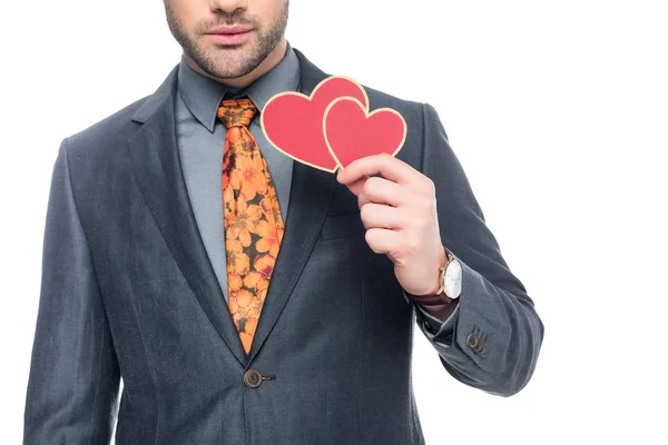 Vista ritagliata dell'uomo con biglietto di auguri di San Valentino, isolato su bianco — Foto stock