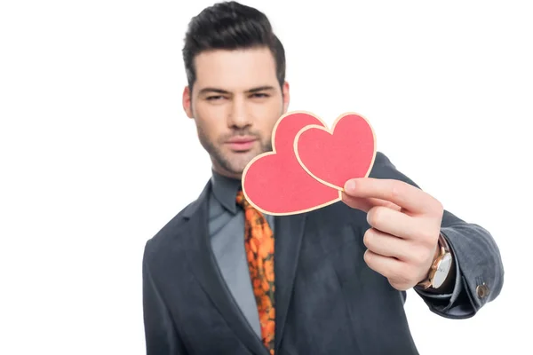 Bel homme avec carte de vœux de Saint-Valentin, isolé sur blanc — Photo de stock