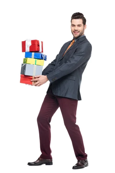 Uomo barbuto contenente scatole regalo, isolato su bianco — Foto stock