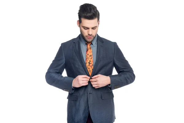 Stylischer Geschäftsmann in Anzug und floraler Krawatte, isoliert auf weiß — Stockfoto