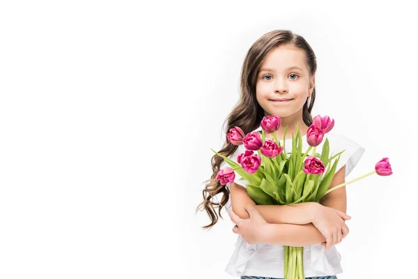 Portrait of cute smiling child with bouquet of flowers in hands isolated on white, mothers day concept — Stock Photo