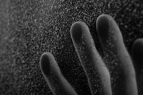 Close-up partial view of human hand touching frosted glass — Stock Photo