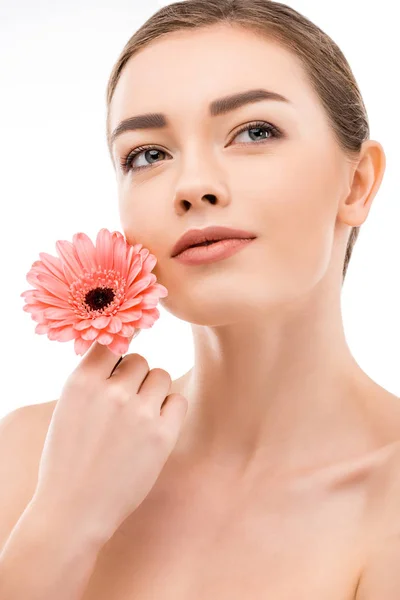 Dreamy girl with perfect clean skin holding flower, isolated on white — Stock Photo