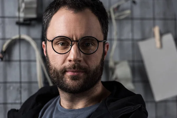 Portrait of caucasian man in glasses  looking at camera — Stock Photo