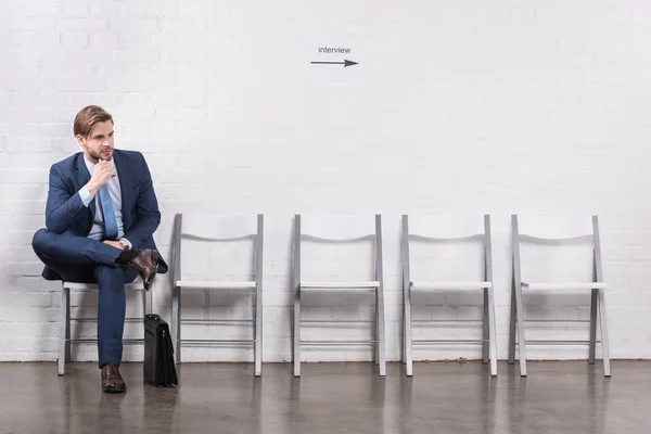 Pensive caucasian businessman waiting for job interview — Stock Photo