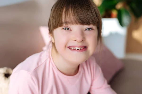 Portrait of happy child with down syndrome — Stock Photo