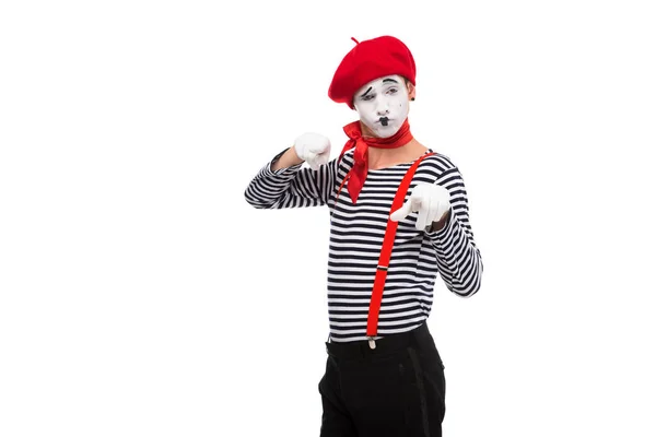 Grimacing mime pointing on camera isolated on white — стоковое фото