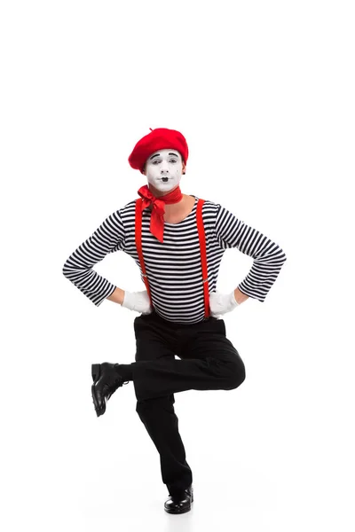 Funny mime performing on one leg isolated on white — Stock Photo