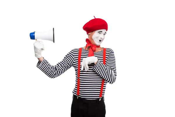 Divertido mimo sosteniendo altavoz aislado en blanco - foto de stock