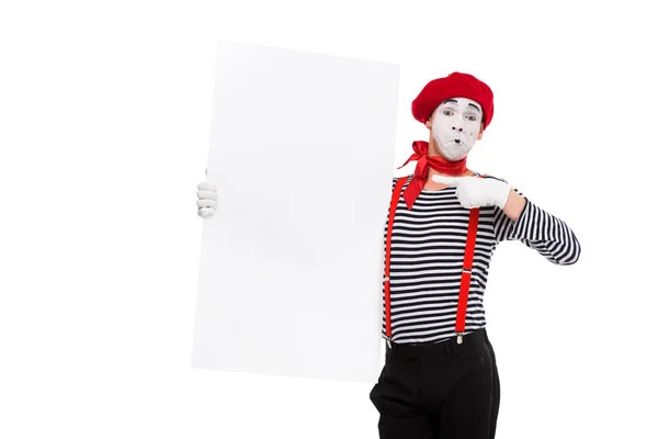 Mime pointing on empty board isolated on white — Stock Photo