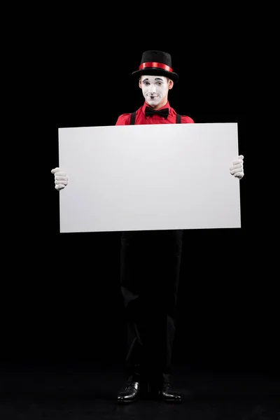 Mime tenant conseil vide isolé sur noir — Photo de stock