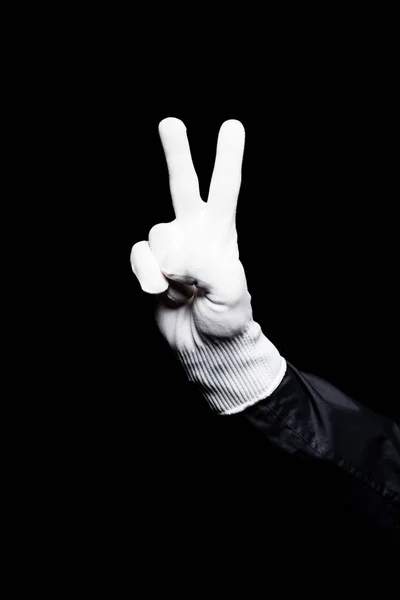 Immagine ritagliata di mimo che mostra segno di pace isolato su nero — Foto stock