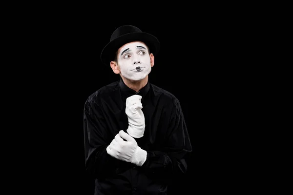 Nachdenklicher Mime schaut vereinzelt auf schwarz weg — Stockfoto