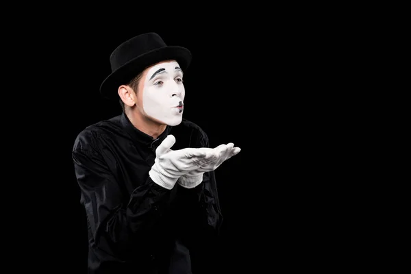 Mime sending air kiss isolated on black — Stock Photo