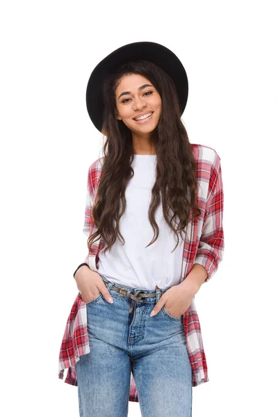 Beautiful young woman in stylish plaid shirt looking at camera isolated on white — Stock Photo