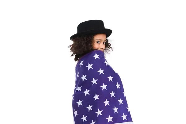 Funny little child in hat covered in usa flag isolated on white — Stock Photo