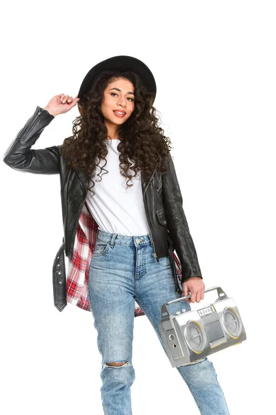Beautiful young woman with vintage boombox isolated on white — Stock Photo