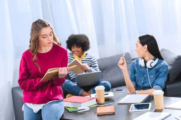 Multicultural group of young students studying together — Stock Photo